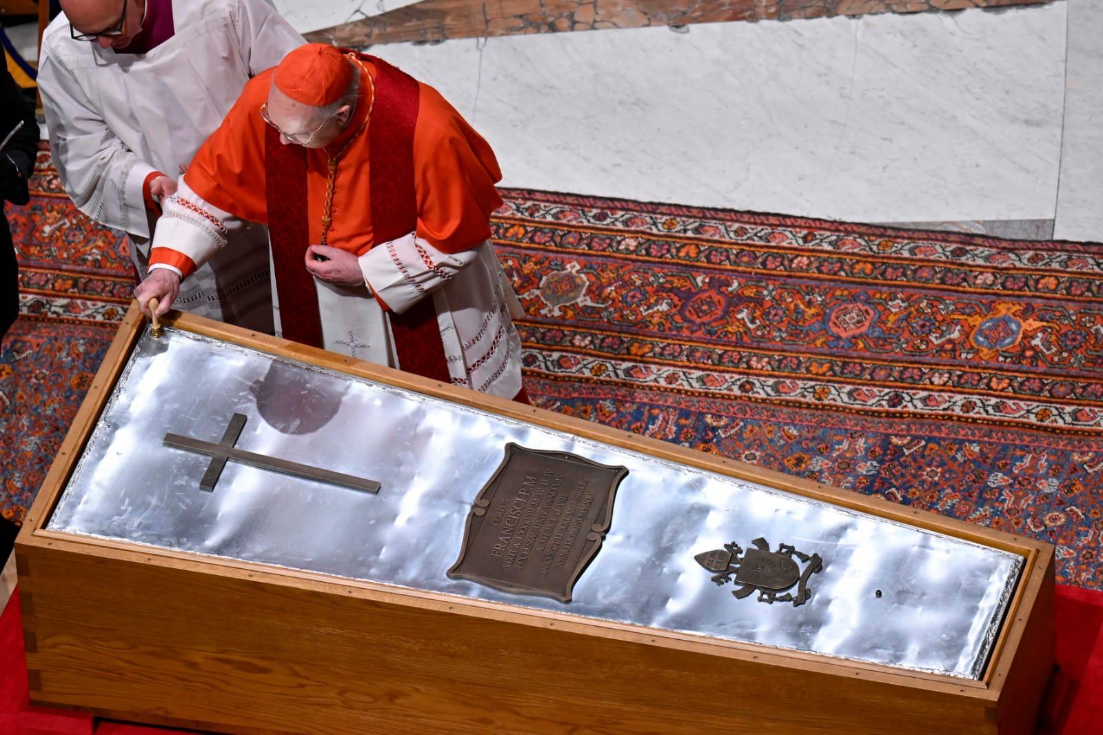 Cardinal Kevin Farrell (the current Camerlengo) Affixes his Seal to Pope Franci Coffin
